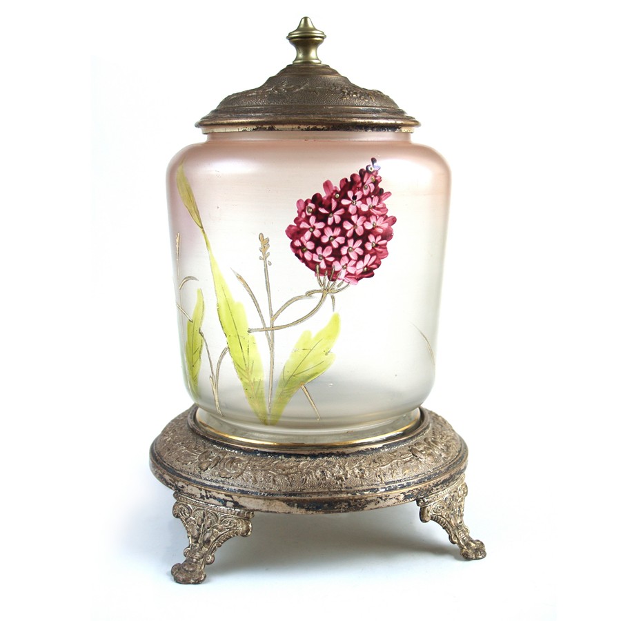 Read more about the article Antike Deckeldose floral bemalt mit Metallfuss